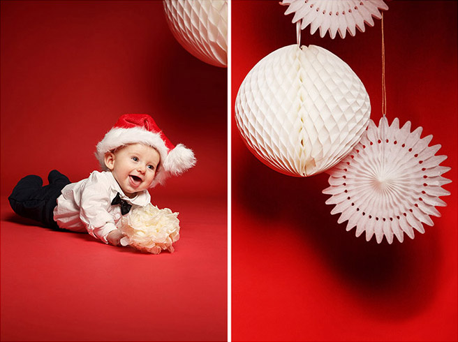 Familienfotos zu Weihnachten von kleinem Kind und weihnachtlicher Dekoration aufgenommen von professioneller Familienfotografin in Berlin © Fotostudio Berlin LUMENTIS